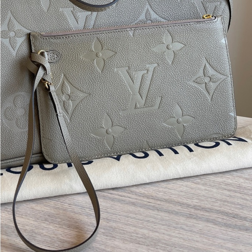 NEW Louis Vuitton Neverfull Empreinte Pouch - rare find & best price on Poshmark